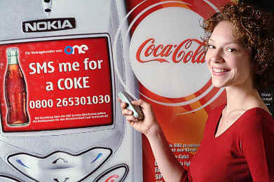 Coca-Cola Automat mit SMS kaufen